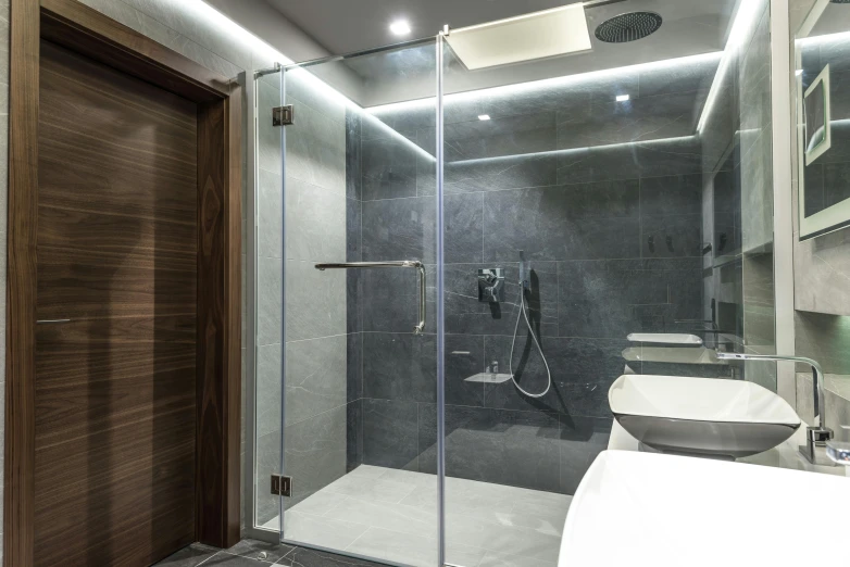 a bathroom with a walk in shower next to a sink, by Alexander Fedosav, shutterstock, commercial lighting, no - text no - logo, showers, ashford black marble