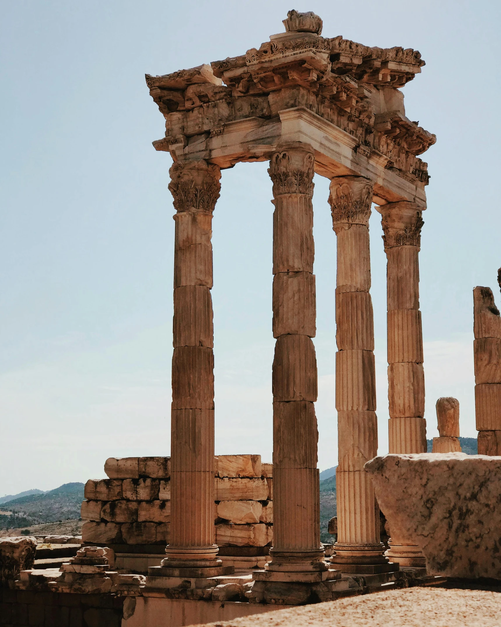 a couple of columns sitting next to each other, pexels contest winner, neoclassicism, temples behind her, square, mediterranean, lgbtq