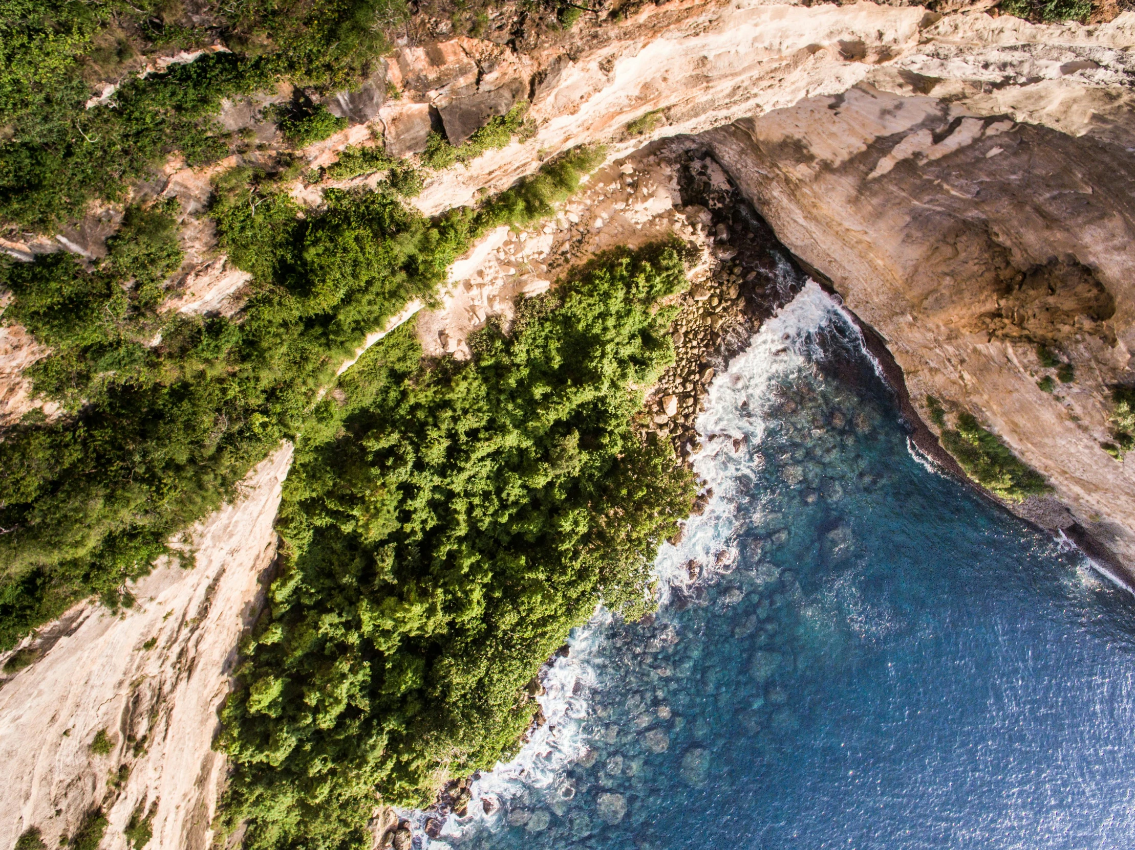 an aerial view of a cliff and a body of water, pexels contest winner, les nabis, caribbean, byzantine, realistic image, lush surroundings