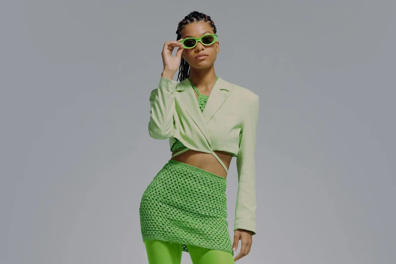 a woman in a green outfit and sunglasses, trending on textures. com, off - white collection, avatar image, midriff