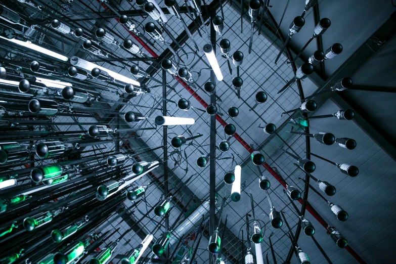 a bunch of lights that are in a room, a digital rendering, inspired by Bruce Munro, unsplash, kinetic art, low angle looking up, futuristic laboratory, instagram post, extreamly detailed data center