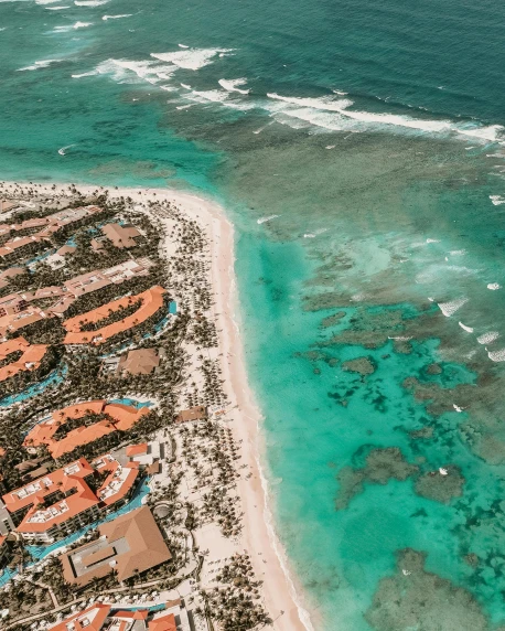 an aerial view of a resort in the middle of the ocean, pexels contest winner, happening, orange and turquoise, thumbnail, highly detailed # no filter, despacito