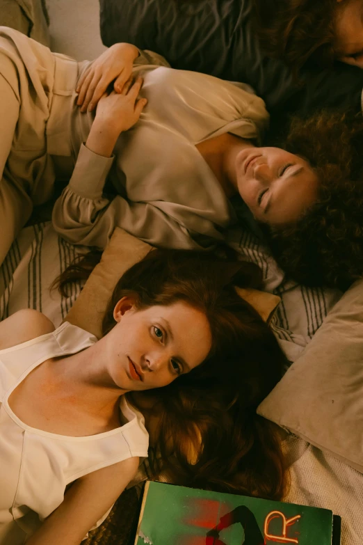 a group of women laying on top of a bed, renaissance, interstellar movie, brunette boy and redhead boy, twins, ignant