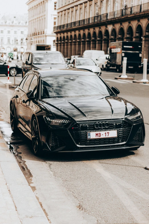 a black car parked on the side of a street, 🚿🗝📝, audiophile, taken in 2022, square