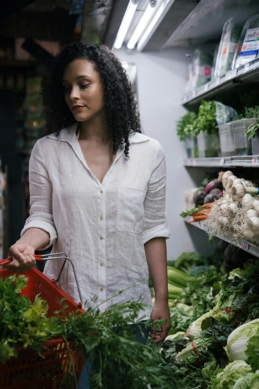 a woman is shopping in a grocery store, pexels, renaissance, tessa thompson, herbs, greens), white