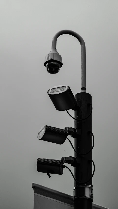 a black and white photo of a street light, unsplash, conceptual art, security camera photo, stacked image, monitors, asset on grey background