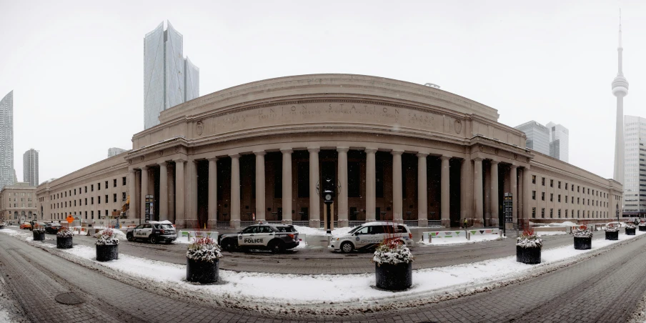 a street filled with lots of snow next to tall buildings, a digital rendering, by Thomas Struth, renaissance, rotunda, 4k panoramic, grand library, medium wide front shot