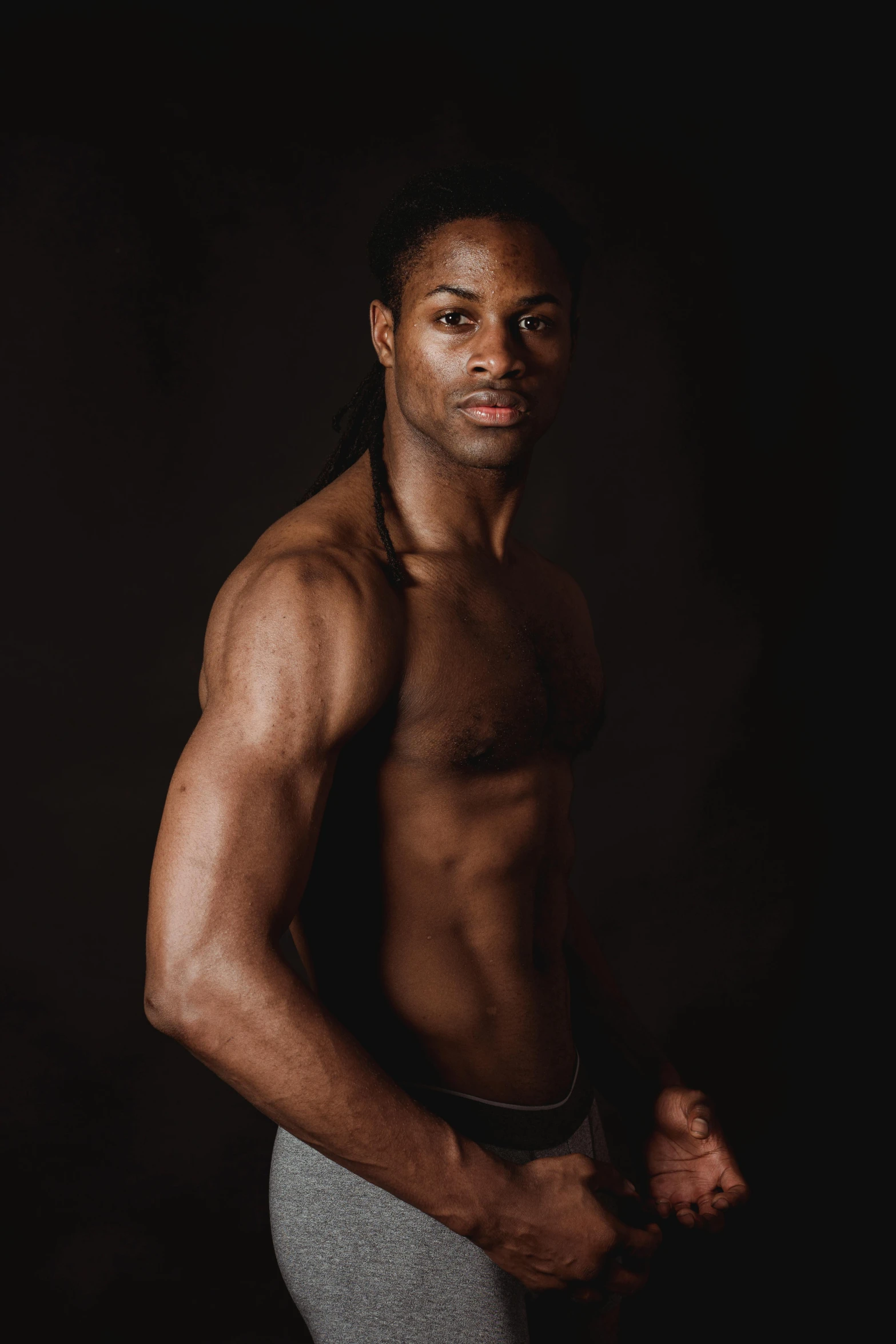 a man standing in front of a black background, inspired by Terrell James, natural physique, promo image, instagram photo, steven wiltshire