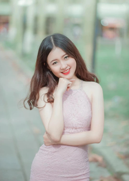 a woman in a pink dress posing for a picture, a picture, inspired by Huang Ji, pexels contest winner, 🤤 girl portrait, square, 18 years old, smol