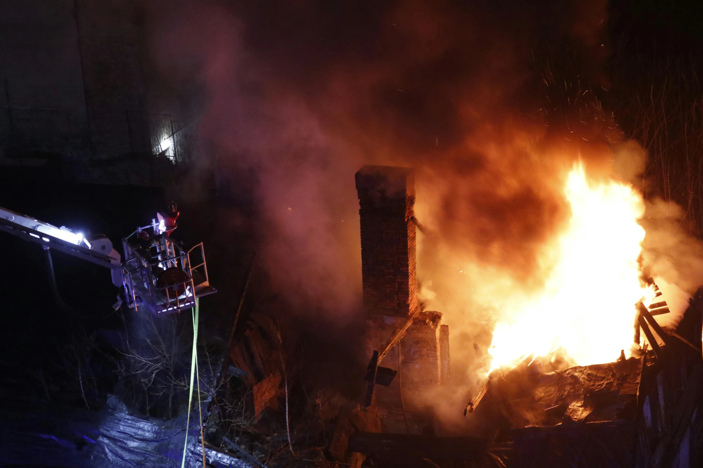 a fire that is burning inside of a building, ap photo, kek, firefighter, title