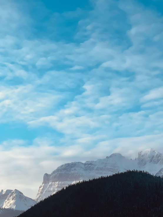 a body of water with a mountain in the background, the sky, banff national park, today\'s featured photograph 4k, icy glaciers