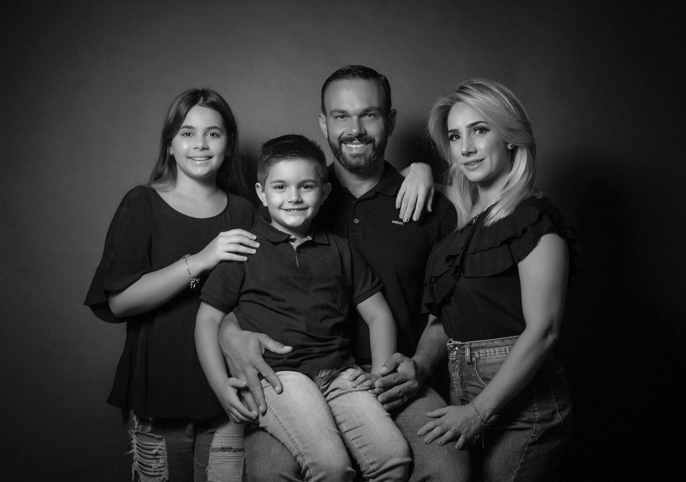a family posing for a black and white photo, a black and white photo, les nabis, amr elshamy, professional profile picture, christian, 15081959 21121991 01012000 4k