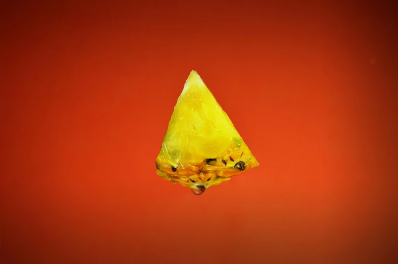 a slice of watermelon on a red background, an album cover, by Justin Sweet, yellow crystal gem, mat collishaw, yellow ochre, cheddar