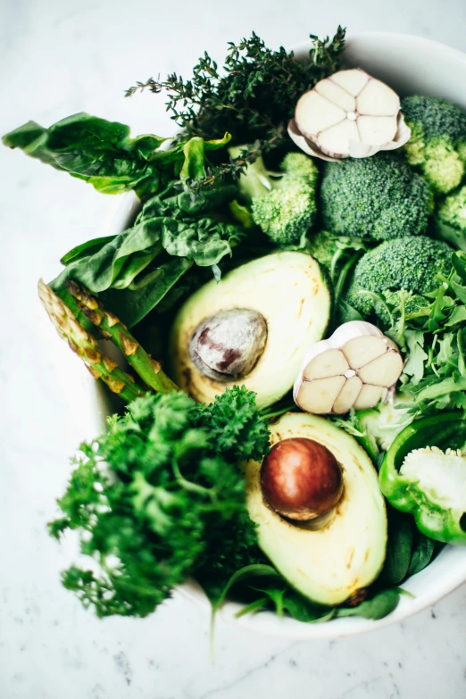 a bowl filled with broccoli, avocado and garlic, pexels, renaissance, lettuce, jade green, avocados, organic armor