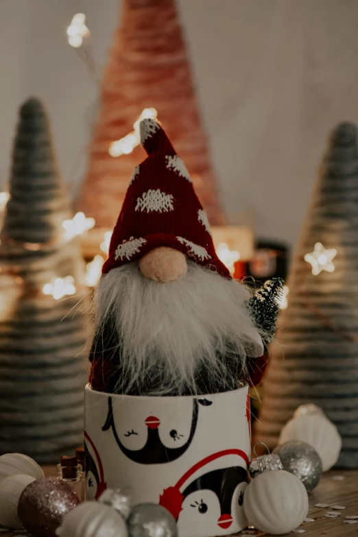 a gnome that is sitting in a cup, inspired by Ernest William Christmas, pexels contest winner, folk art, cozy lights, chic, medium height, twinkling stars