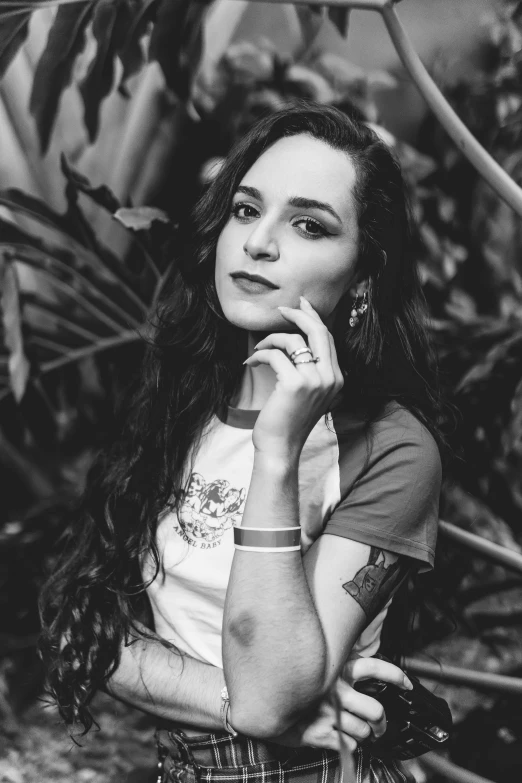 a black and white photo of a woman with long hair, by Amelia Peláez, show, fernanda suarez, young female, uploaded