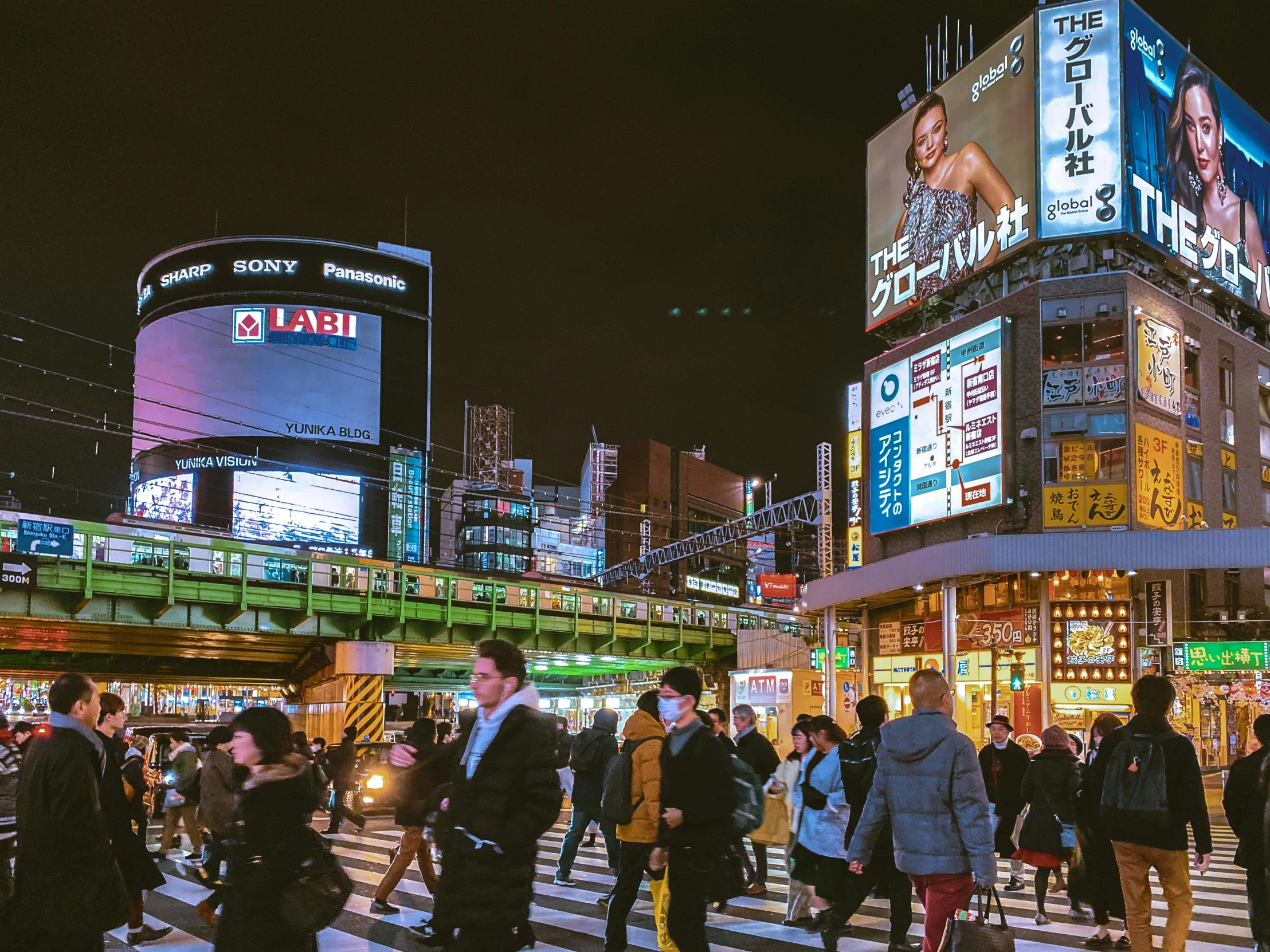 a group of people crossing a street at night, pexels contest winner, ukiyo-e, digital billboard in the middle, terminal, thumbnail, shibuya