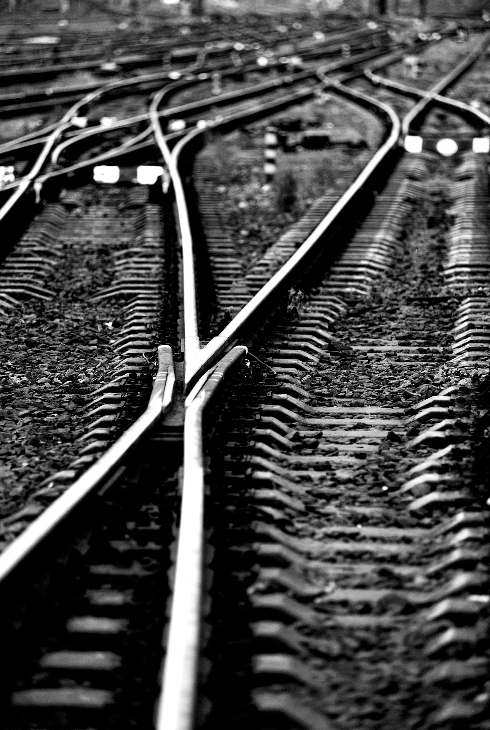 a black and white photo of train tracks, a black and white photo, by Lucia Peka, flickr, precisionism, close-up!!!!!!, square lines, switches, !!!!!!!!!!!!!!!!!!!!!!!!!