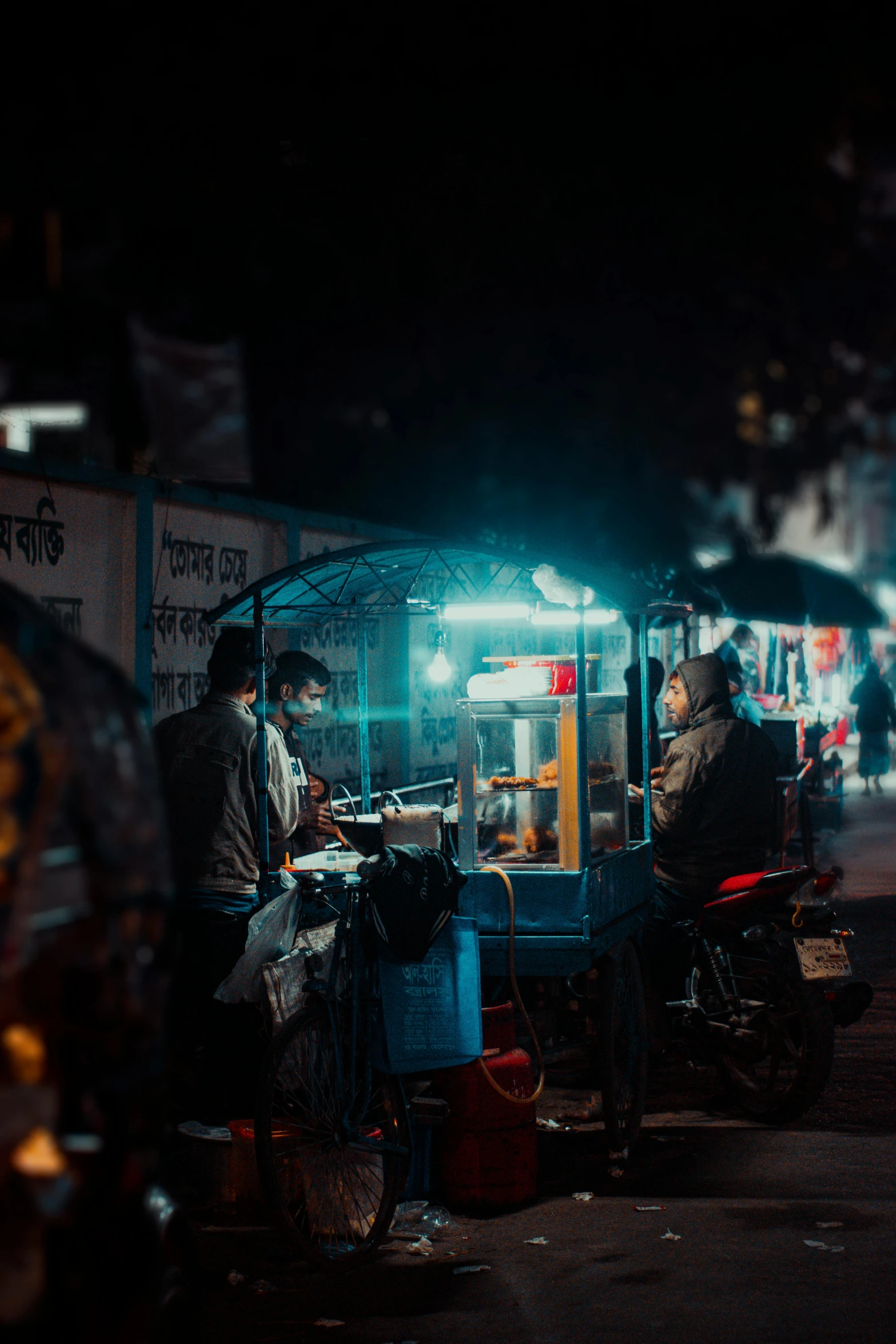 a group of people walking down a street at night, food stall, top selection on unsplash, dhaka traffic, cyberpunk photo