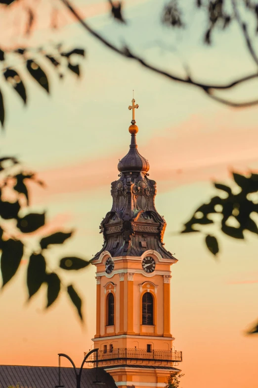 a large building with a clock on top of it, a picture, by Emma Andijewska, unsplash contest winner, baroque, golden hour 4k, holy cross, neoclassical tower with dome, university