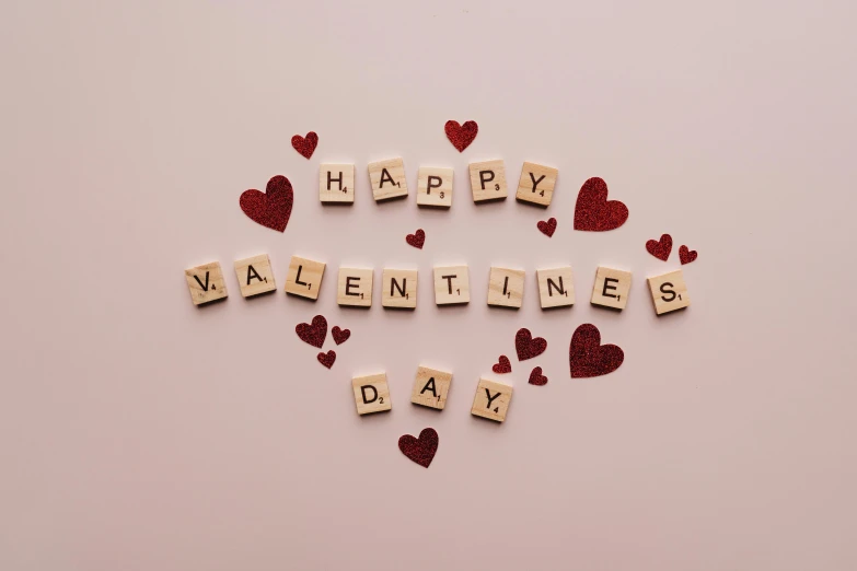 wooden letters spelling happy valentine's day surrounded by hearts, by Valentine Hugo, pexels, on a pale background, background image, thumbnail, | 35mm|