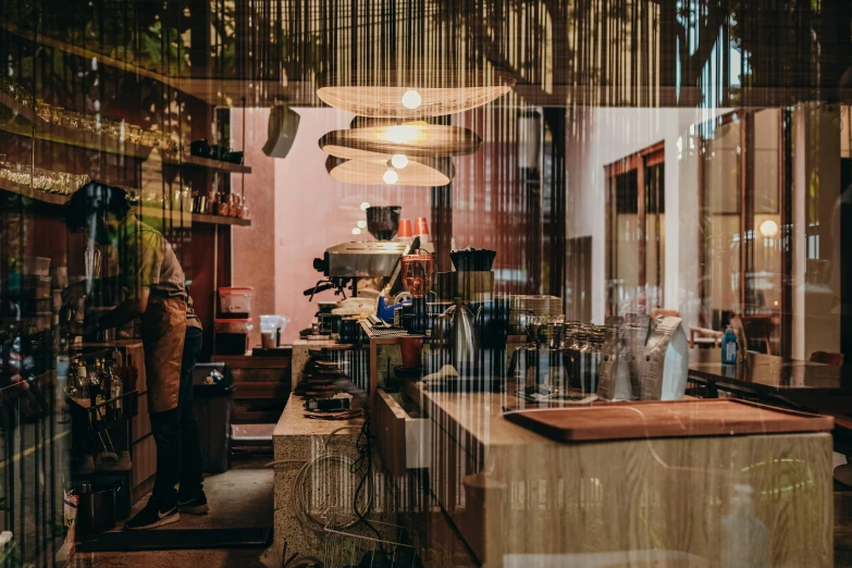 a view of a coffee shop through a glass window, pexels contest winner, modern lush condo as shopfront, chef table, aussie baristas, thumbnail