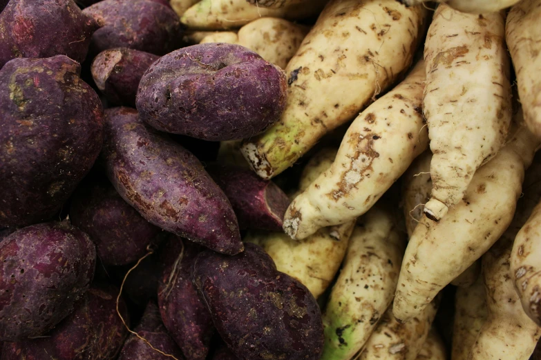 a pile of purple potatoes sitting on top of each other, by Robert Medley, unsplash, renaissance, assamese, portrait image, beige, 1 4 8 0 s