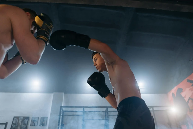 a couple of men standing next to each other in a boxing ring, pexels contest winner, happening, thrusters, avatar image, in an action pose, indoor shot