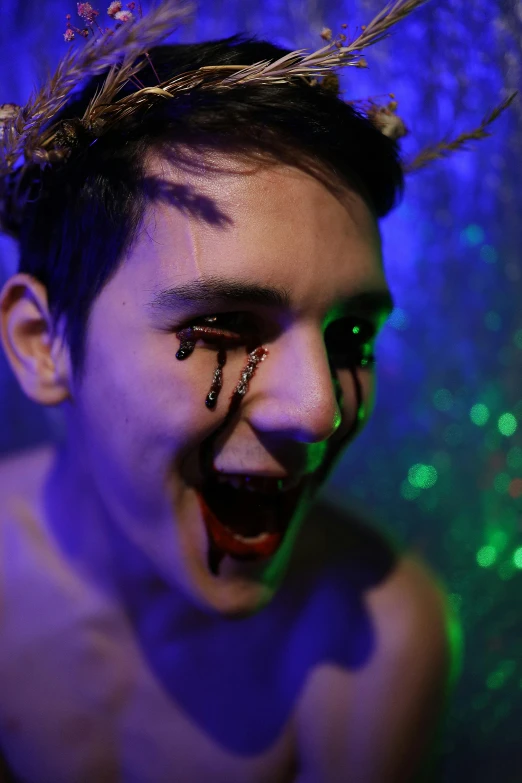 a young man with a creepy look on his face, an album cover, by Hannah Tompkins, reddit, transgressive art, goblins partying at a rave, blood in the seahighly, lgbtq, creepy macro photo