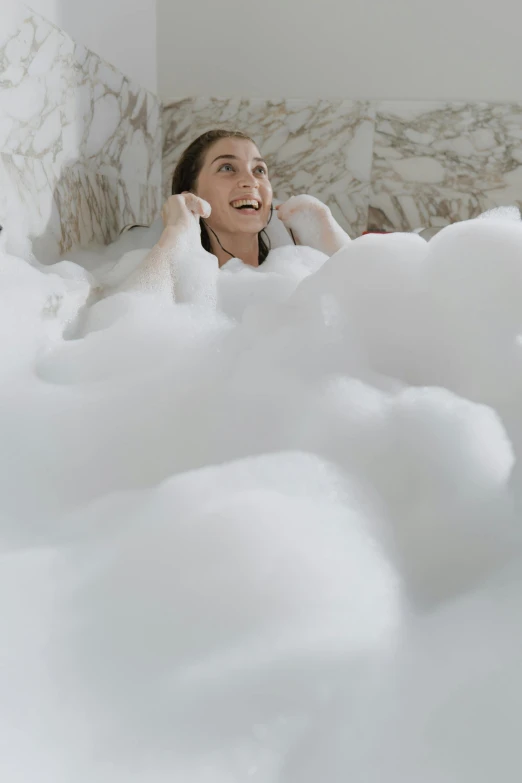 a woman laying in a bathtub filled with foam, round clouds, looking happy, made of lab tissue, cloud palace