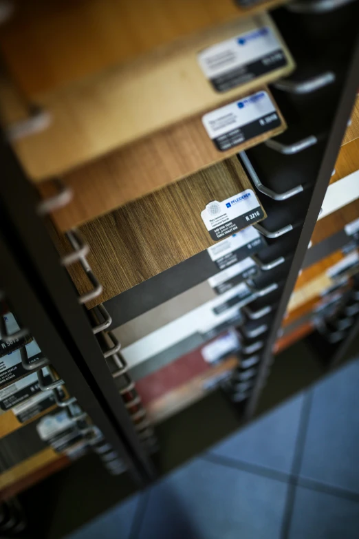 a number of cell phones on display in a store, a picture, unsplash, bauhaus, detailed wood, color chart, close - up on detailed, vinyl material