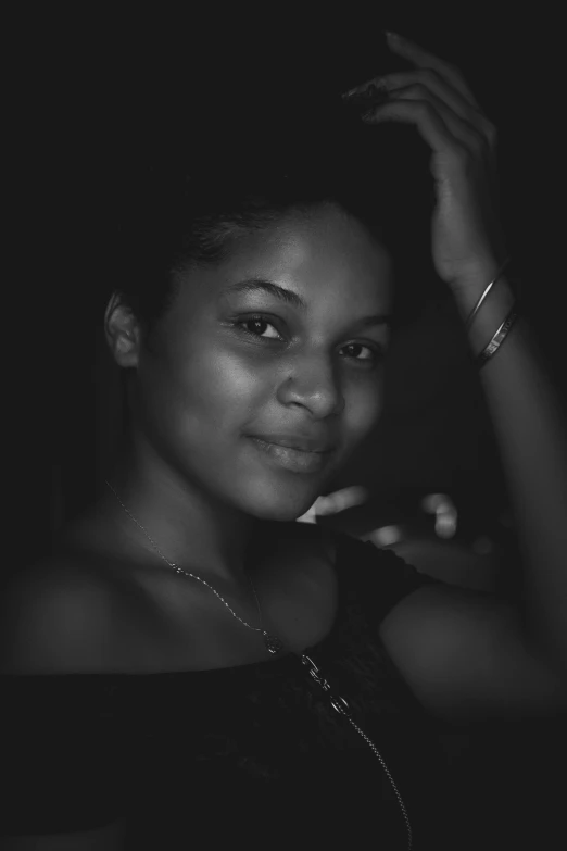 a black and white photo of a woman brushing her teeth, a black and white photo, by Chinwe Chukwuogo-Roy, dark and dim lighting, facebook profile picture, pretty pretty face, nigth