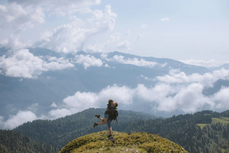 a person standing on top of a mountain with a dog, by Emma Andijewska, pexels contest winner, figuration libre, running and falling on clouds, cottagecore hippie, with a backpack, avatar image