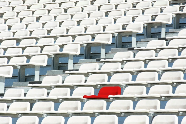 a red chair sitting in the middle of a stadium, a cartoon, inspired by Andreas Gursky, unsplash contest winner, an all white human, square, dezeen, bench