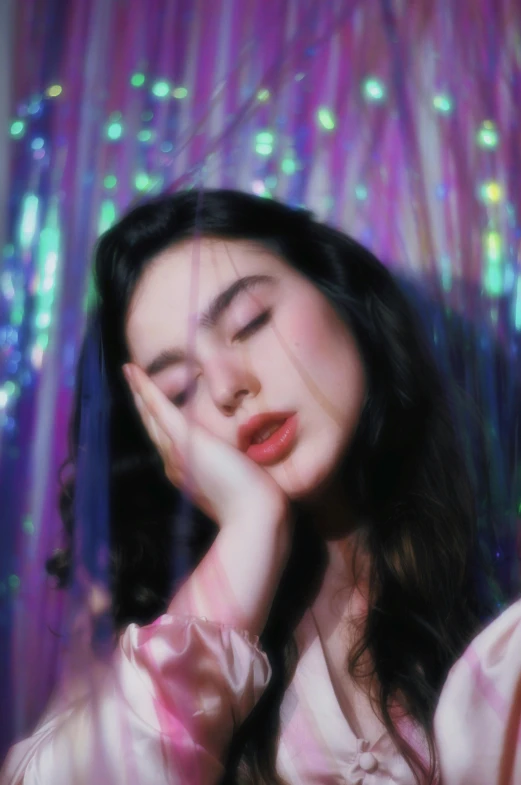 a woman in a pink dress holding her hand to her face, a colorized photo, inspired by Elsa Bleda, trending on pexels, holography, dua lipa, 8 0 s asian neon movie still, asleep, glitter gif