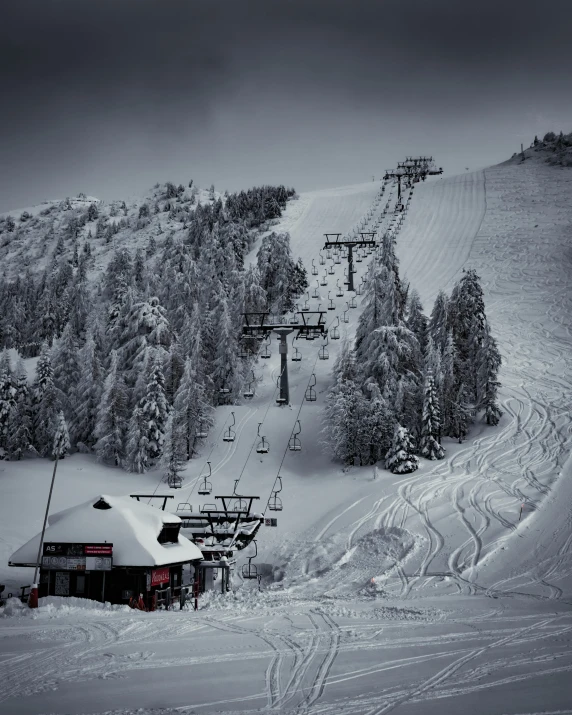 a ski lift sitting on top of a snow covered slope, pexels contest winner, renaissance, on a dark winter's day, thumbnail, multiple stories, cute photo