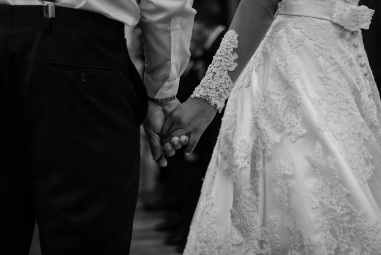 a black and white photo of a bride and groom holding hands, pexels, renaissance, white and black clothing, diverse, 15081959 21121991 01012000 4k, thumbnail