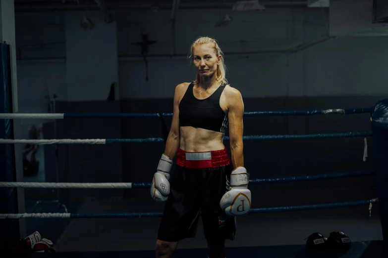 a female boxer standing in a boxing ring, a portrait, inspired by Louisa Matthíasdóttir, unsplash, mid body shot, lachlan bailey, commercial photo, instagram picture