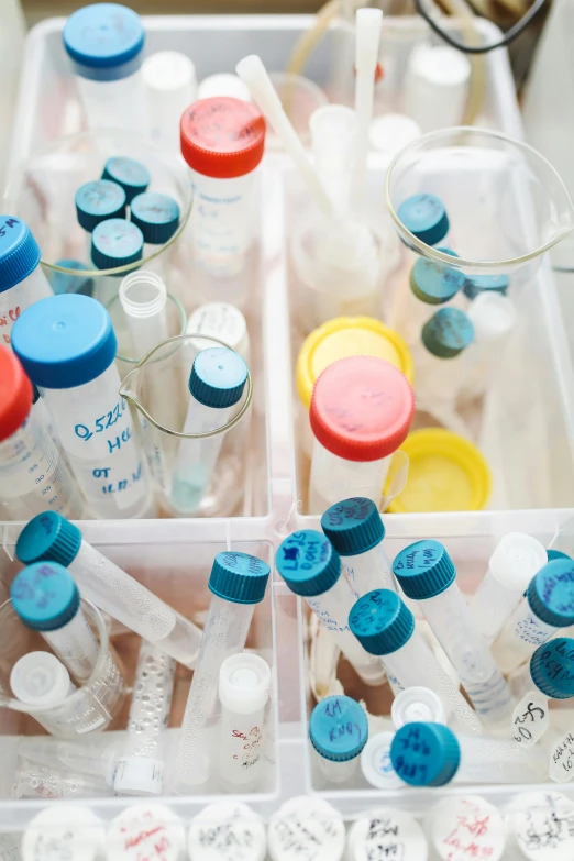 a drawer filled with lots of bottles and vials, unsplash, process art, pathology sample test tubes, such as bacteria, white, lab background