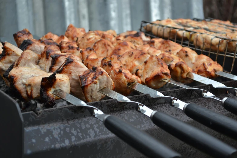 a bunch of meat sitting on top of a grill, hurufiyya, profile image, detailing, caulfield, thumbnail