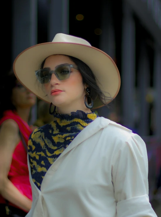 a woman wearing a hat and a scarf, a portrait, by Winona Nelson, pexels contest winner, renaissance, at new york fashion week, ana de la reguera portrait, shades, square