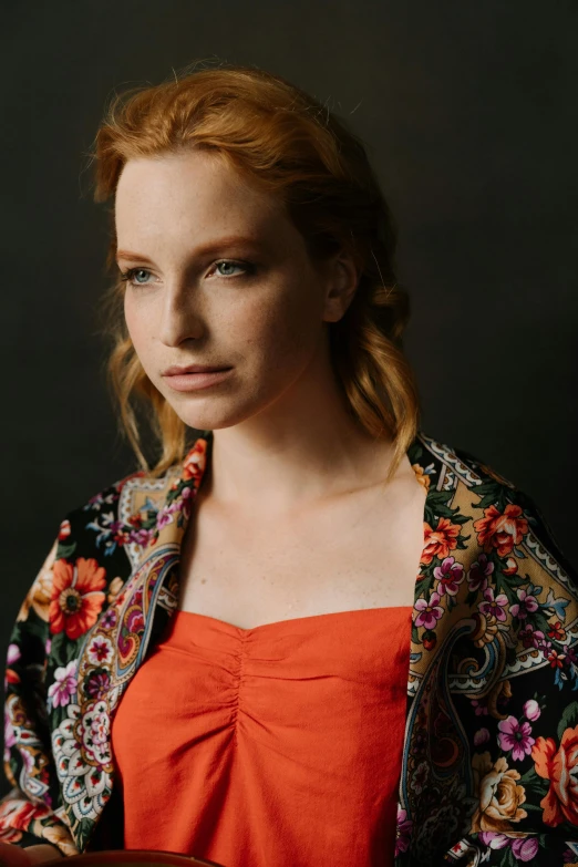 a close up of a woman holding a plate of food, a portrait, by Winona Nelson, unsplash, renaissance, jessica chastain, standing with a black background, eleanor tomlinson, wrapped in cables and flowers