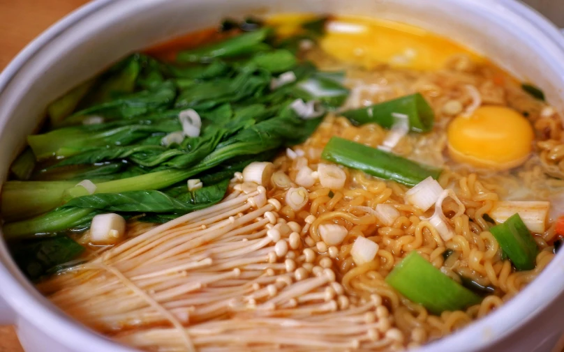 a close up of a bowl of food on a table, noodles, square, fan favorite, image