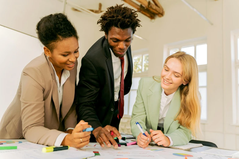 a group of people sitting around a table working on a project, trending on pexels, professional profile picture, schools, brown, promotional image