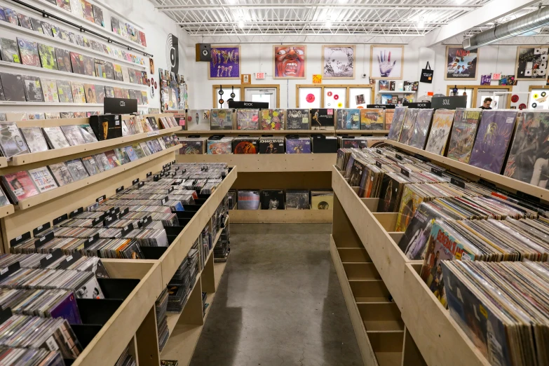 a store filled with lots of cds and cds, an album cover, unsplash, underground comix, charles burns, “wide shot, very smooth, dj