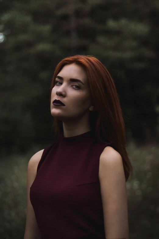 a woman with red hair standing in a forest, an album cover, inspired by Elsa Bleda, pexels contest winner, portrait of a vampire, headshot profile picture, 5 0 0 px models, dark dress