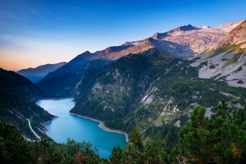 a large body of water surrounded by mountains, by Franz Hegi, pexels contest winner, fan favorite, late summer evening, alps, slide show