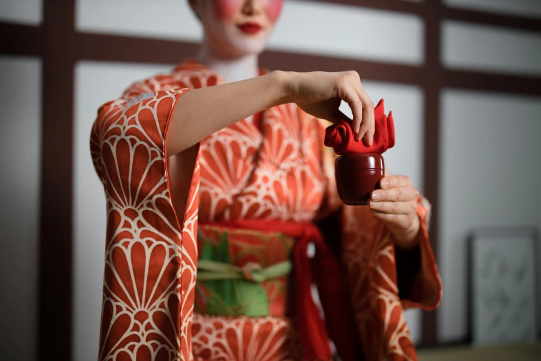 a close up of a person in a kimono, inspired by Otake Chikuha, trending on unsplash, pop up parade figure, drinking, performance art, ( ( theatrical ) )