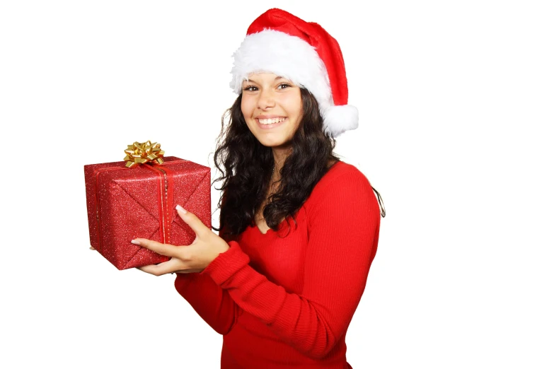 a woman in a santa hat holding a christmas present, pixabay, square, long hair and red shirt, information, 18 years old