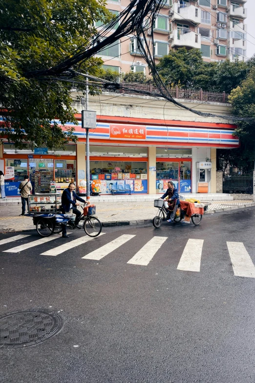 a group of people riding motorcycles down a street, an album cover, by Jang Seung-eop, trending on reddit, convenience store, chile, 2 5 6 x 2 5 6 pixels, empty streetscapes